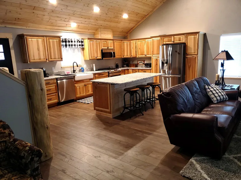 Glacier luxury cottage kitchen with hickory cabinets