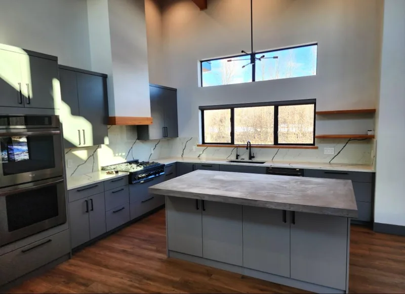 Custom kitchen with Huntwood cabinets, concrete and quartz, River Frontage Montana Style