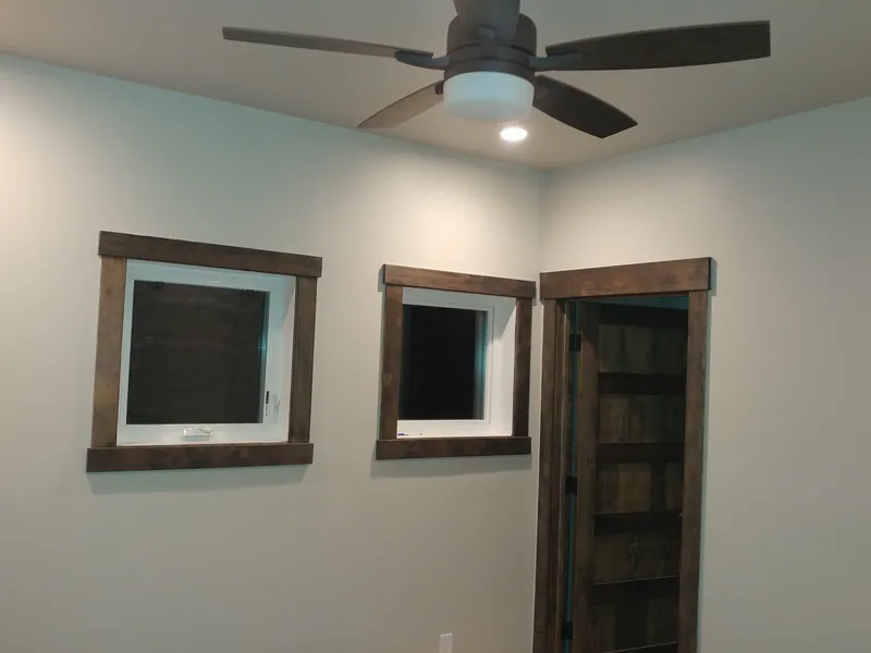 Dark pine trim, Barndominium Flathead Montana Style by Built Right in Montana