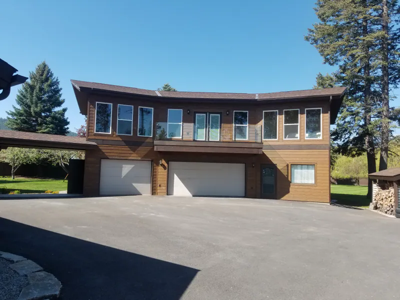 The Flathead Lake remodel: the finished second-storey addition seen from the lake side