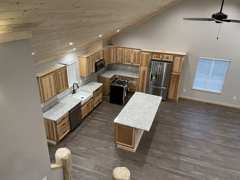 Custom granite and farmhouse sink, Glacier Park Retreat by Built Right in Montana