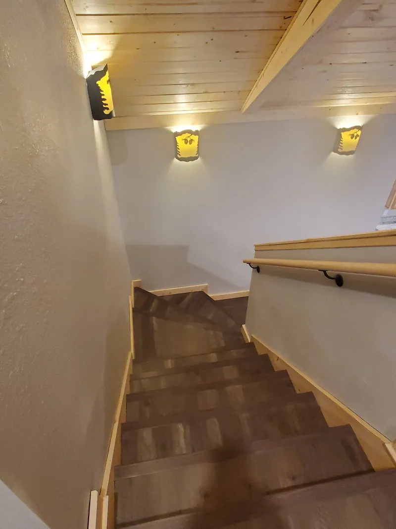 Custom stairs and lighting, Glacier Park Retreat by Built Right in Montana