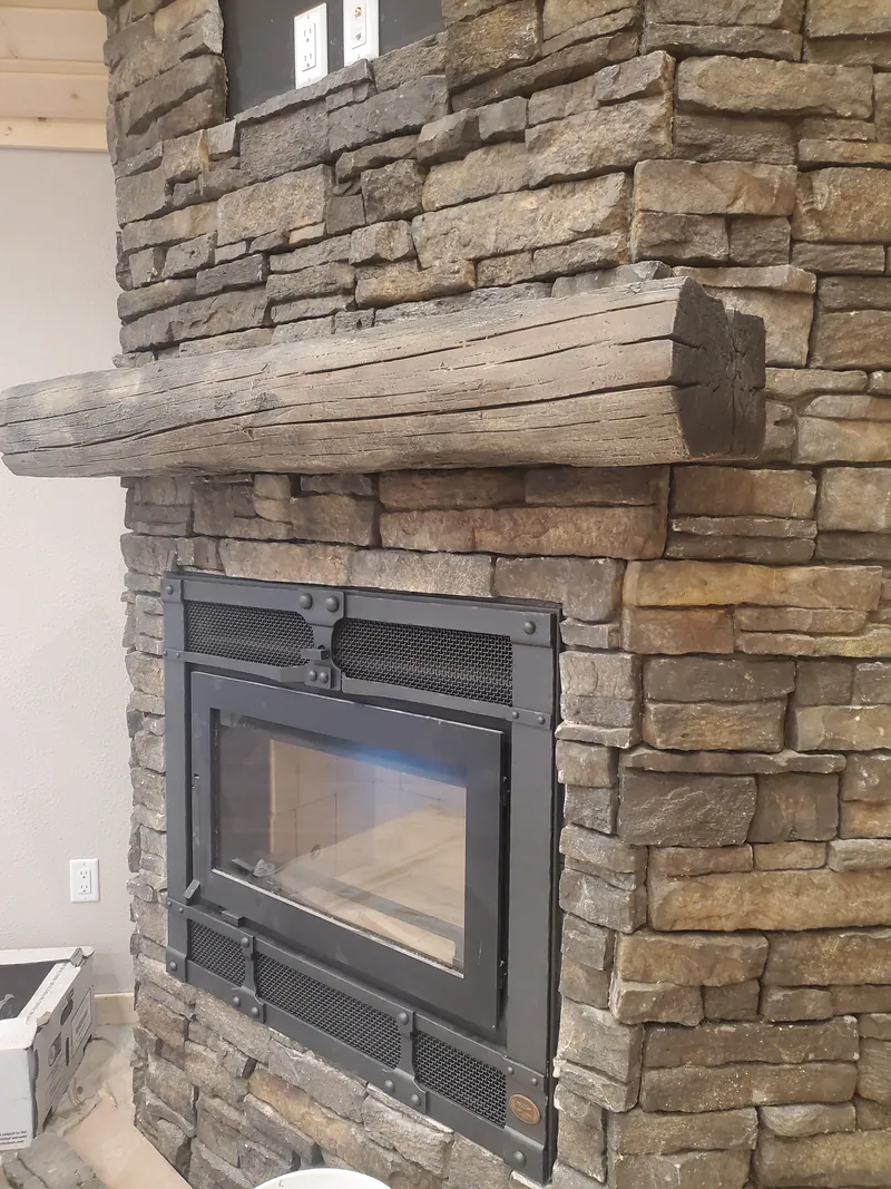 Custom stone fireplace, Glacier Park Retreat by Built Right in Montana