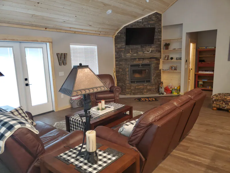 Glacier home fireplace and furnishings, Glacier Park Retreat by Built Right in Montana
