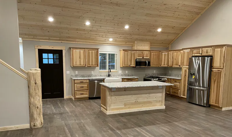 Rustic hickory cabinets, Glacier Park Retreat by Built Right in Montana