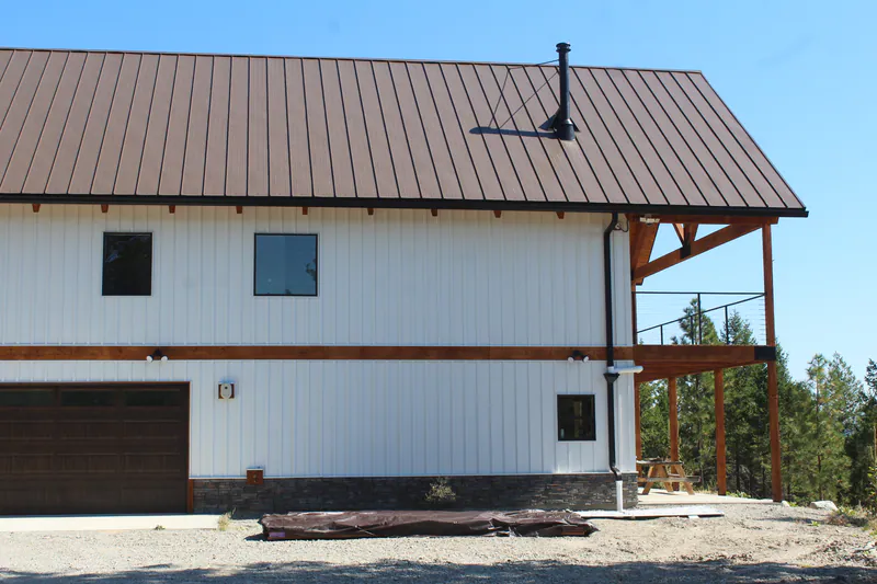 Metal siding and timber-frame accents on a Built Right home