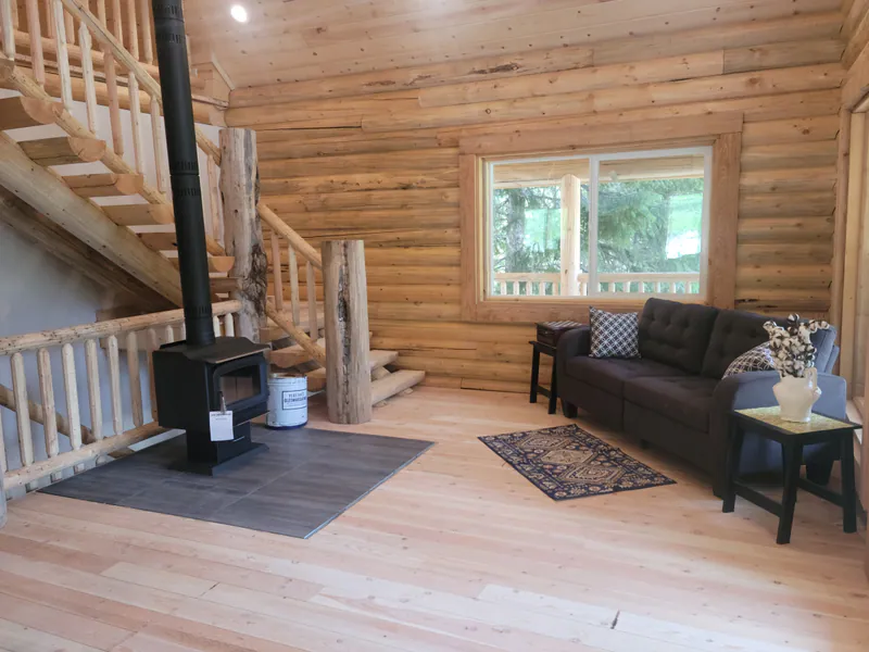 Hardwood floors and a warm fire, Montana Luxury Log Cabin by Built Right in Montana