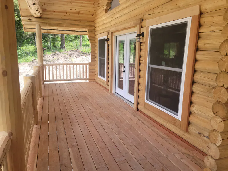 Log cabin deck, Montana Luxury Log Cabin by Built Right in Montana
