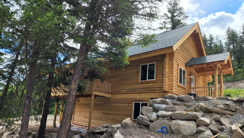 A log mountainside getaway built by Built Right in Montana