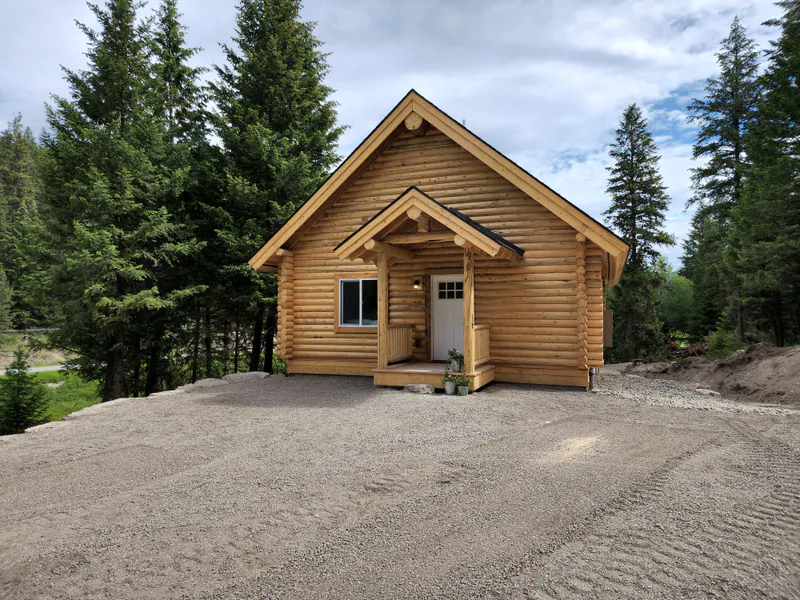 Spacious parking for the Montana toys, Montana Luxury Log Cabin by Built Right in Montana