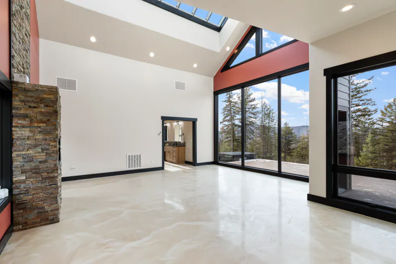 Huge skylight over epoxy floors, Mountain Modern Living Flathead Montana by Built Right in Montana