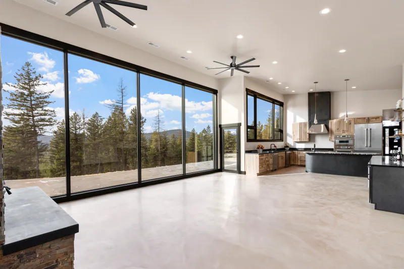 Large glass wall with Montana views in a Built Right custom home