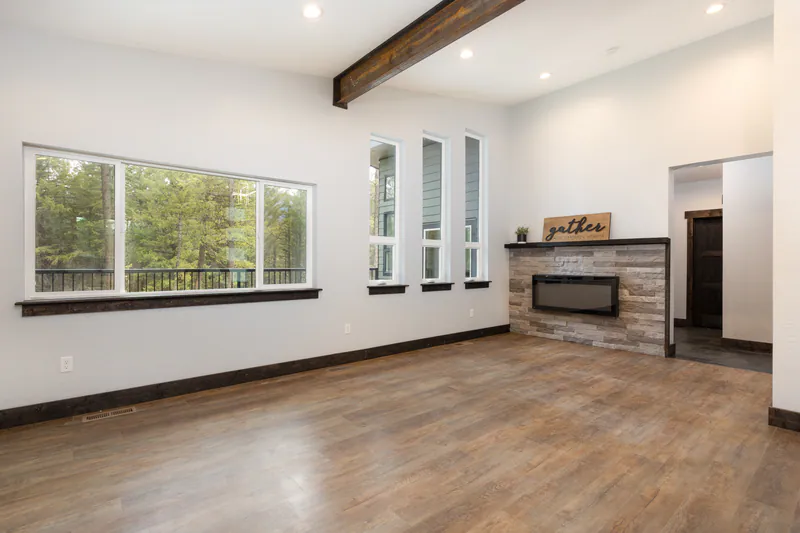 Steel beams and warm fire, Modern Living Montana Built by Built Right in Montana
