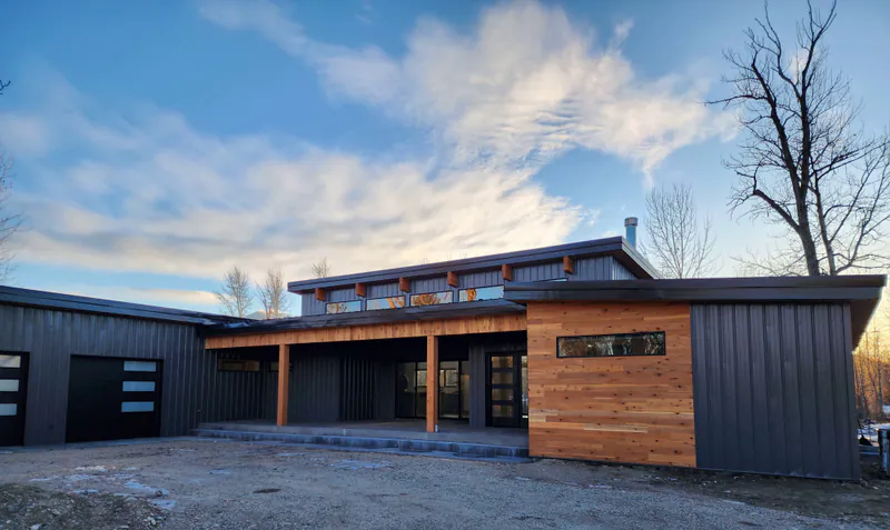 Cedar and metal siding, River Frontage Montana Style by Built Right in Montana