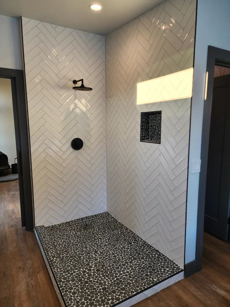 Herringbone subway tile, River Frontage Montana Style by Built Right in Montana