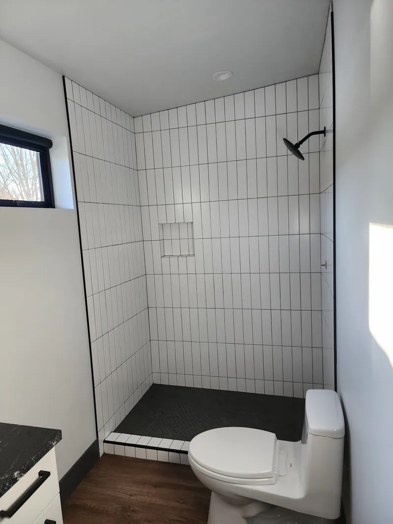 Vertical stacked subway tile, River Frontage Montana Style by Built Right in Montana