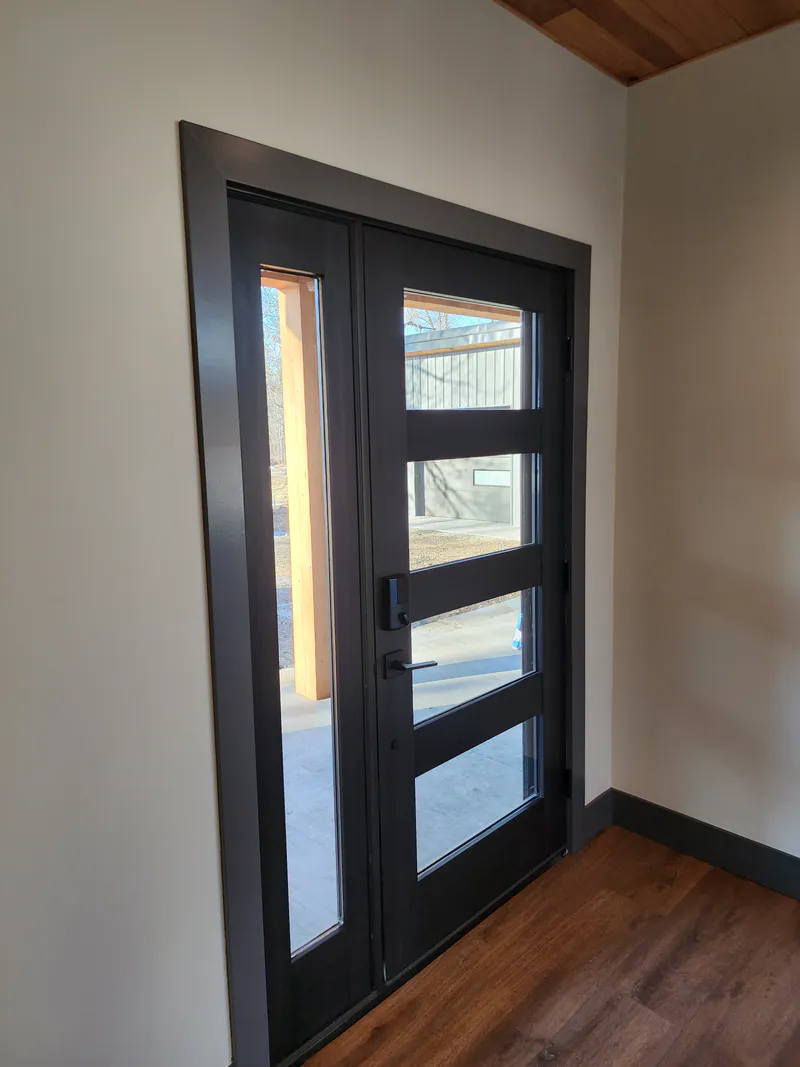 Custom glass entry door with sidelight, River Frontage Montana Style by Built Right in Montana