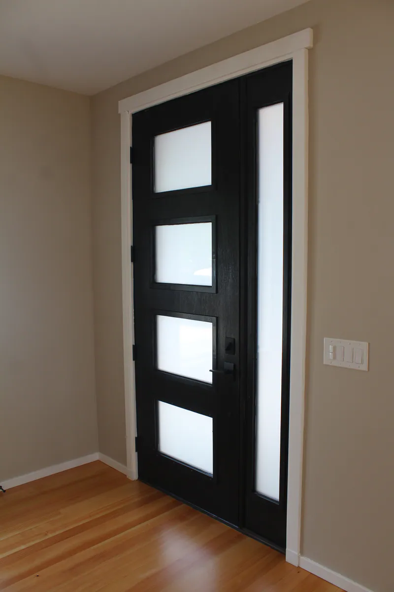 Modern glass front door, Secluded Flathead Montana Luxury by Built Right in Montana